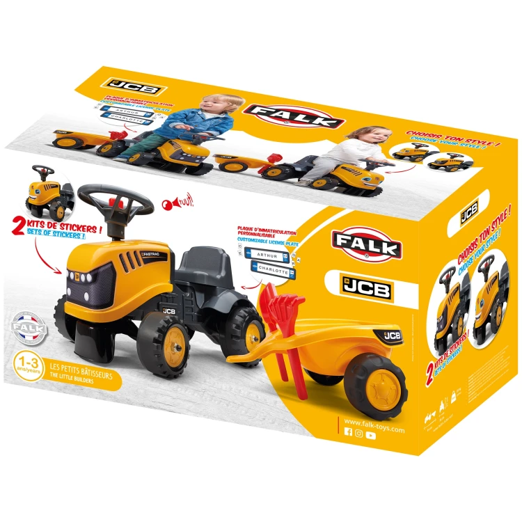 Przyczepka odłączona obok traktorka FALK JCB — ujęcie pokazuje cały profil przyczepy oraz mechanizm zaczepu