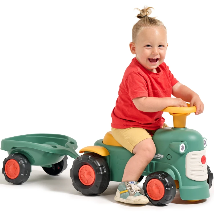 Traktorek Baby Maurice FALK w zielonym, vintage stylu z przyczepką — detal kierownicy i lampy