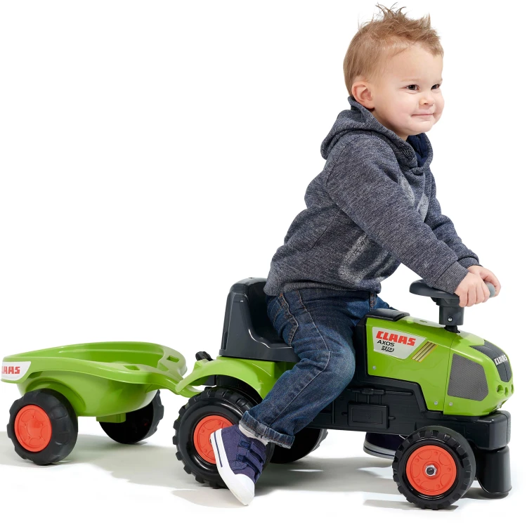 Przód traktorka Baby Claas — grill, reflektory i solidna przednia część w zielonym kolorze