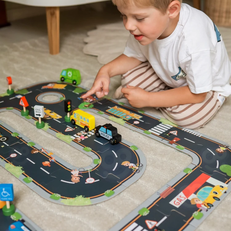 Zakręt autostrady ułożony z puzzli — widoczny profil pasa ruchu w zestawie WOOPIE 21 el.