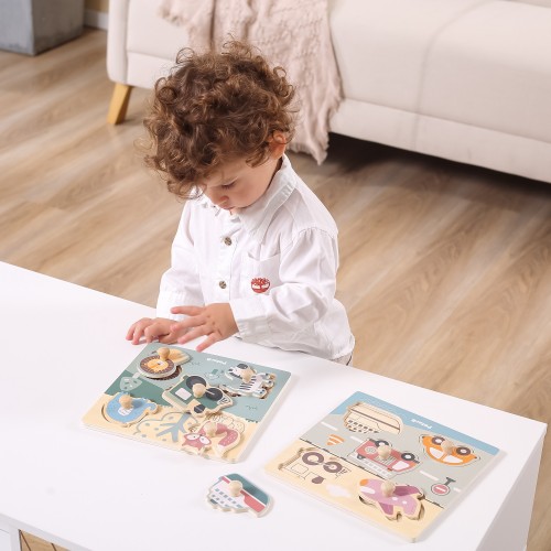 Zbliżenie na drewniane elementy puzzle VIGA PolarB — kolorowe zwierzątka i pionowe pinezki