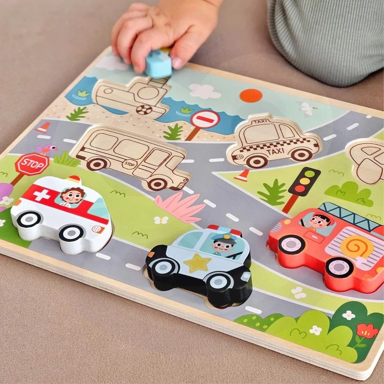 Plansza z wycięciami do dopasowywania kształtów — puzzle pojazdy i miasto z motywami TOOKY TOY