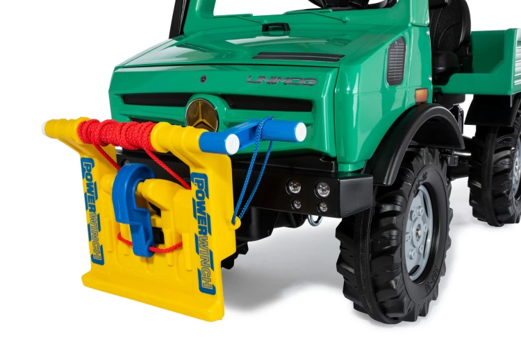 Profil boczny ciężarówki na pedały RollyUnimog - widoczne zawieszenie i przestronna platforma ładunkowa