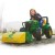 Rolly Toys — boczny profil FarmTrac z widocznymi pedałami, kołem i ergonomicznym siedzeniem, ujęcie z boku