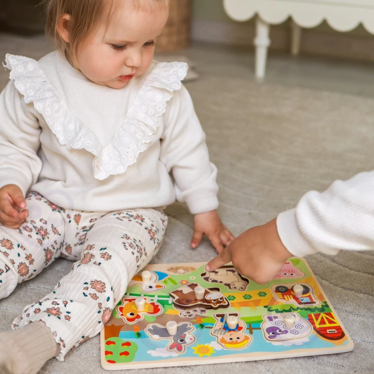 Opakowanie zestawu Drewniane Puzzle Montessori — widoczna grafika pudełka i etykieta producenta