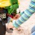 Tył pojazdu RollyBackhoe Rolly Toys — zaczep montażowy, stabilne podwozie i antypoślizgowe stopnie
