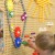 Plansza z ustawionymi kołami zębatymi — schemat przenoszenia ruchu na tablicy STEM MASTERKIDZ