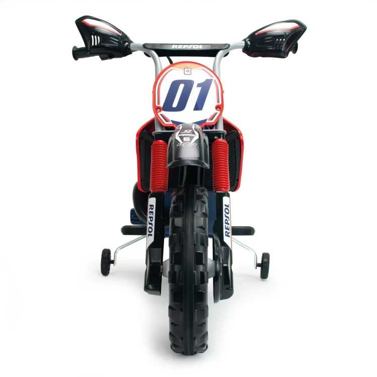 Zbliżenie na naklejki i lakier INJUSA Repsol 6V — detale graficzne i wykończenie powierzchni