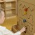 Tył z wygodnym uchwytem do zawieszenia — Tablica Przesuwna Mała Motoryka Montessori MASTERKIDZ, widoczne zamocowania