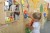 Zbliżenie na współpracujące koła zębate i łańcuch, detal zębatek z zestawu MASTERKIDZ do konstruowania mechanizmów