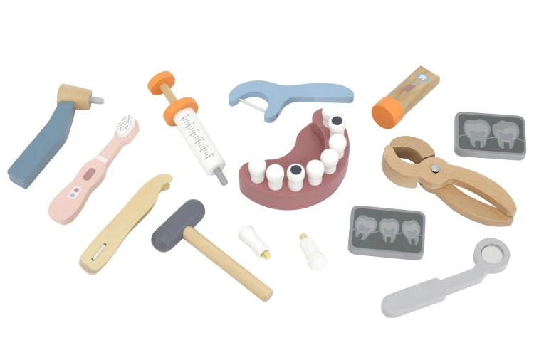 Rząd narzędzi dentystycznych VIGA ułożony na stole — różne kształty i kolory dla małych pacjentów