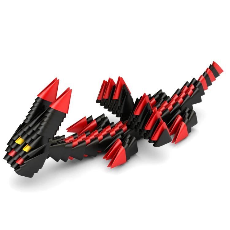 Zbliżenie na pojedyncze elementy Meli Gami pokazujące kształt kieszonek i klapek do łączenia origami.