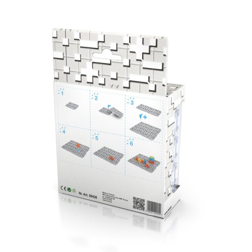Zbliżenie na łączenia płytek Meli Maxi Gray, detal złącza pokazujący sposób łączenia z klockami 4,2 × 4,2 cm.