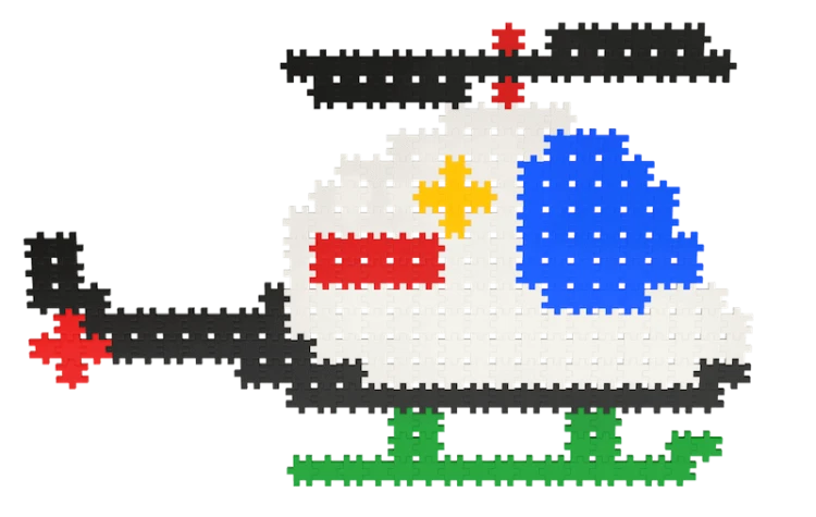 Klocki Meli Minis w intensywnych kolorach rozsypane na jasnym tle, widoczna wielkość poszczególnych wafli 1,5×1,5 cm