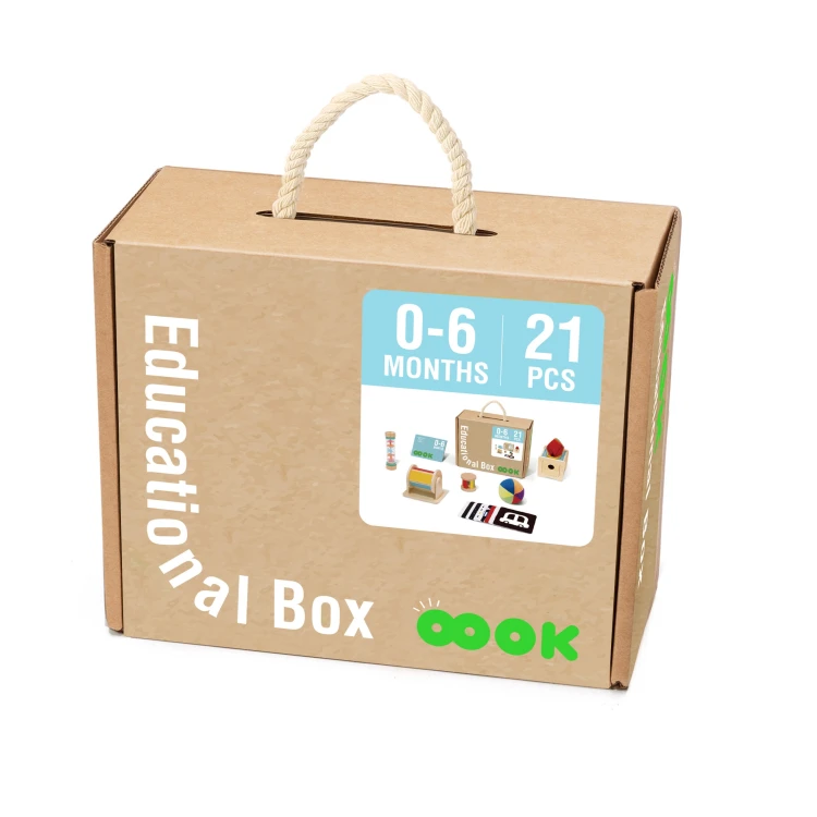 Niemowlę bawi się TOOKY TOY Box Pudełko — sensoryczna zabawa dla dzieci 0-6 mies z bezpiecznymi elementami.