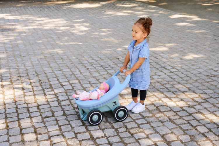 Zbliżenie rączki i mechanizmu składania BIG Buggy 3 w 1 marki 54, widoczne zapięcia i estetyczne szwy tapicerki.