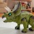 Opakowanie zestawu WOOPIE — Triceratops RC w pudełku z ilustrowaną instrukcją