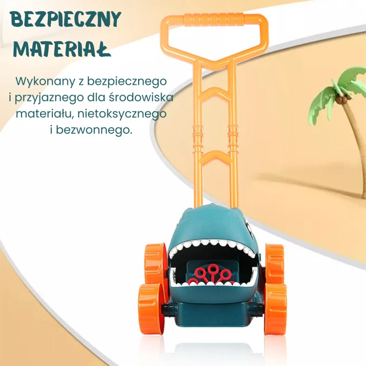 Detal kółek i mechanizmu napędowego — dno kosiarki WOOPIE z widocznymi łączeniami i kolorowymi akcentami