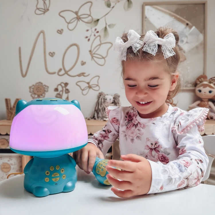 Opakowanie i etykiety WOOPIE — turkusowa lampka RGB z informacjami o funkcjach Bluetooth, karaoke i wejściach audio