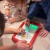 Ujęcie z góry WOOPIE Magiczny Tablet — cała powierzchnia robocza widoczna z intensywnymi kolorami neonów
