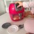 Zbliżenie na kolorowe grafiki i etykiety na obudowie WOOPIE Air Fryer, detale dekoracyjne przykuwające wzrok