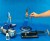 Widok całego zestawu do doświadczeń: klosz próżniowy, dzwonek, pompa ręczna i elektryczna oraz miernik dźwięku gotowe do demonstracji