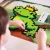 Zestaw Meli Minis Dragon ułożony na stole edukacyjnym, elementy 1,5 × 1,5 cm użyte do tworzenia kompozycji 3D.