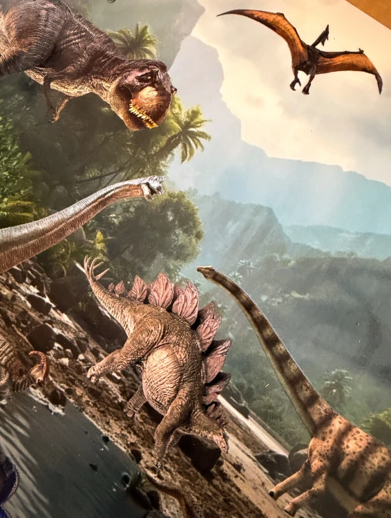 Plansza z prehistorycznym krajobrazem w wyszukiwarce dinozaurów EDUBOBO