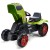 Traktor Claas Arion 470 FALK z odczepianą przyczepką na tle zielonej trawy