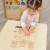 Zbliżenie na ilustracje przedstawiające kiełkowanie fasoli na tablicy MASTERKIDZ