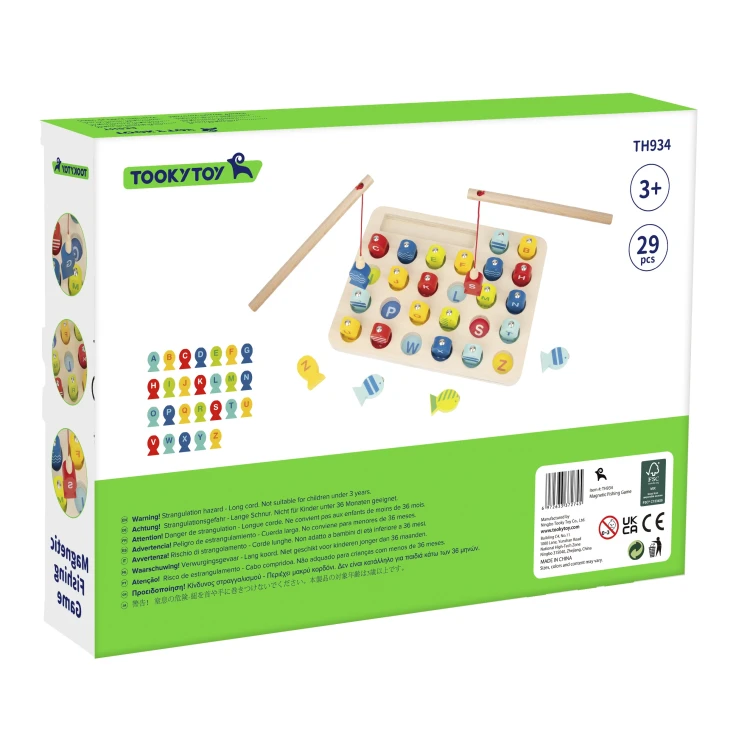 Dziecko łowiące rybki za pomocą wędki z magnesem w zestawie TOOKY TOY