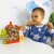 Zbliżenie na drewniane patyczki i figurkę kury w grze Farma Spadająca Kura TOOKY TOY