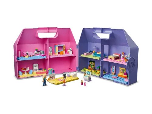 Widok z bliska na elementy zestawu LEGO Friends 42697 z walizką i domkiem dla lalek